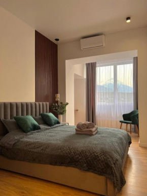 Cozy apartment with an exceptional view of the mountains of Almaty